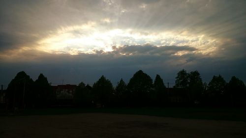 Scenic view of landscape against cloudy sky