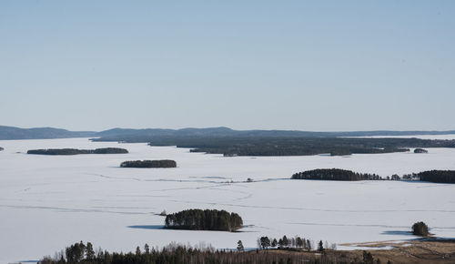 View over the mountains and the frozen baltic sea in northern sweden