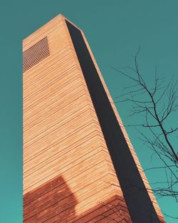 Low angle view of building against blue sky