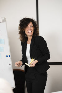 Businesswoman talking during business meeting