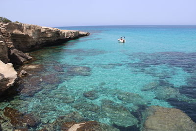 Scenic view of sea against clear sky