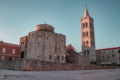 Low angle view of historic building against clear sky