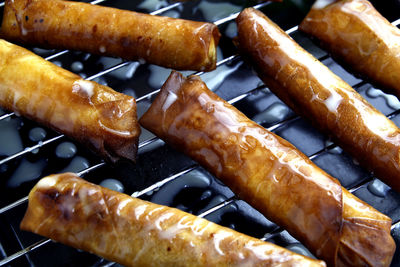 Close-up of meat on barbecue grill