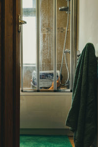 Train seen through window at home