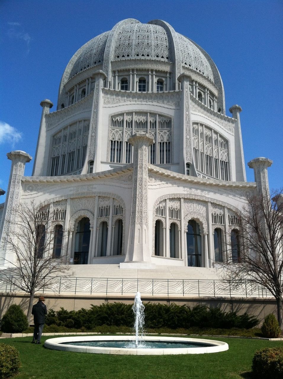 architecture, building exterior, built structure, blue, low angle view, sky, facade, sunlight, dome, fountain, church, travel destinations, statue, religion, sculpture, day, place of worship, city, spirituality