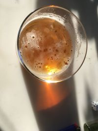 Close-up of beer glass on table