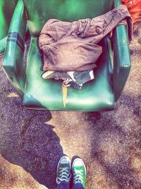 Low section of woman standing on tiled floor
