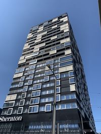 Low angle view of modern building against clear sky