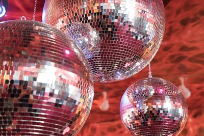 Close-up of illuminated lighting equipment at night