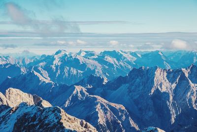 Scenic view of snowcapped mountains against sky