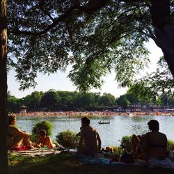 People relaxing in water