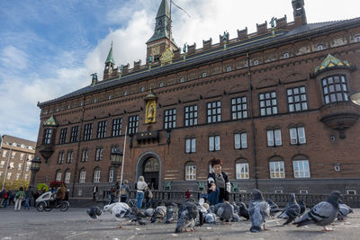 Group of people in front of building