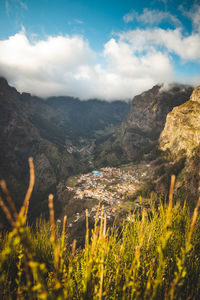 Tourist destination, curral das freiras, a village nestled in the mountains with minimal sunlight