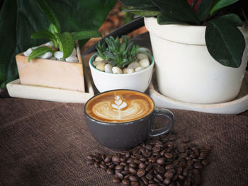 Close-up of coffee cup on table