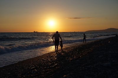 Scenic view of sea at sunset