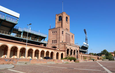 View of historical building against clear blue sky