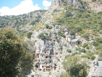 Castle on mountain against sky