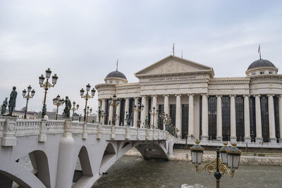 View of mosque against cloudy sky