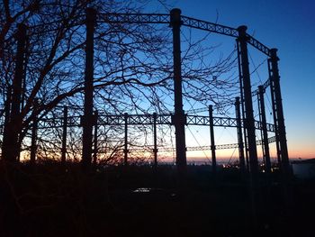 Silhouette of tree against sky at sunset