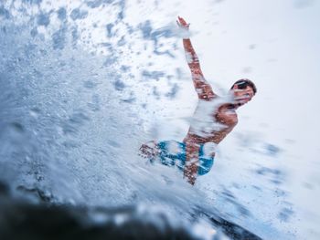 Man surfing in sea