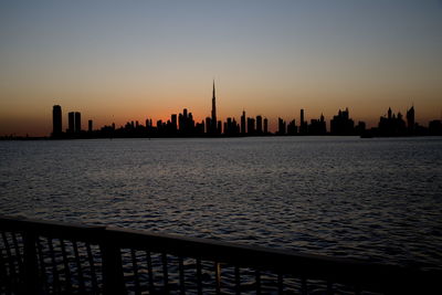 Dubai slyline from dubai creek harbour and dubai canal to downtown and business bay, uae