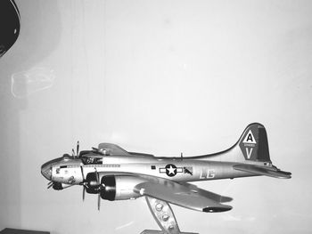 Side view of airplane against sky