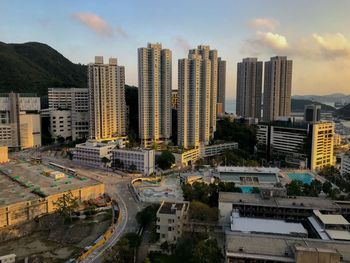 High angle view of buildings in city against sky