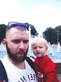 Portrait of father with son
