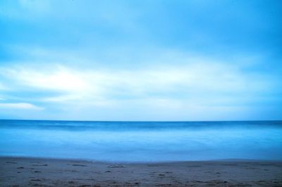 View of calm blue sea against the sky