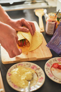 Midsection of person preparing food