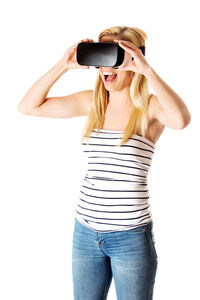 Midsection of woman wearing hat against white background