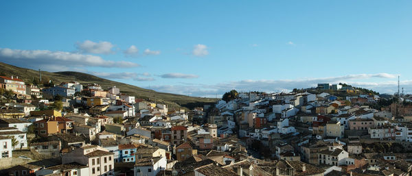 Aerial view of townscape against sky