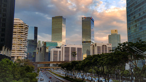 Panoramic view of buildings in city against sky