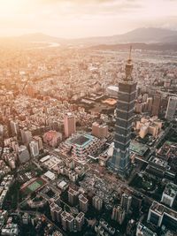 High angle view of cityscape against sky during sunset