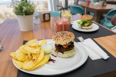 Close-up of burger in plate on table