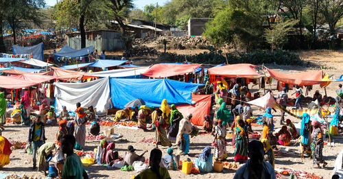 People at market stall