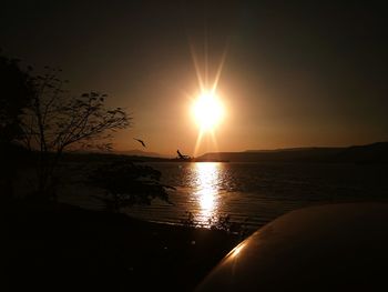 Sunset over calm sea