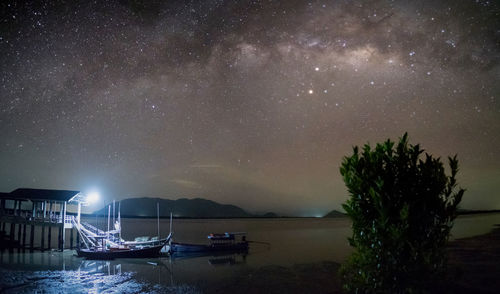 Scenic view of sea against sky at night