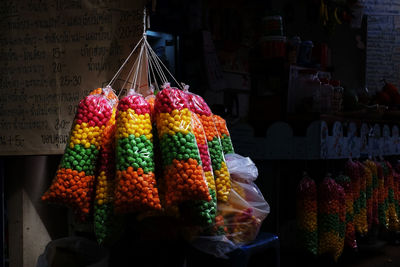 Multi colored vegetables for sale at market stall