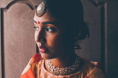 Portrait of young man looking away