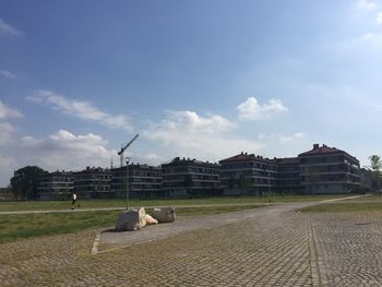 Built structure against cloudy sky