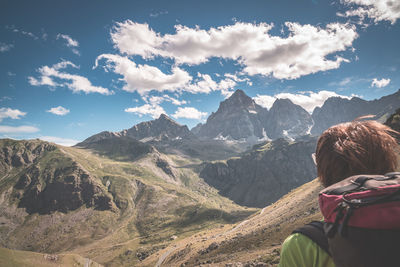 Man against mountains and sky