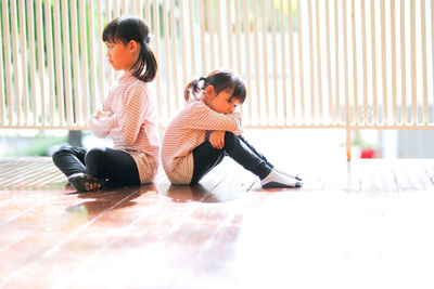Women sitting on floor