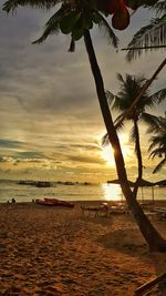 Scenic view of sea against sky at sunset