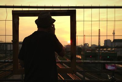 Silhouette of woman at sunset