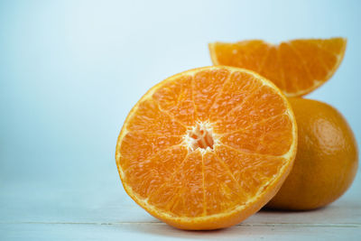 Close-up of orange slices on table