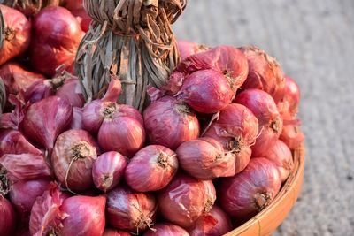 Dry red onion in basket
