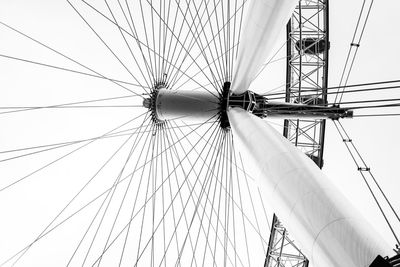 Low angle view of ferris wheel against sky