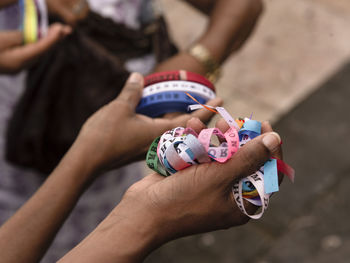 Close-up of woman holding hands