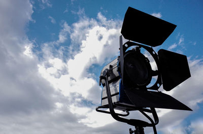 Strobe light against cloudy sky